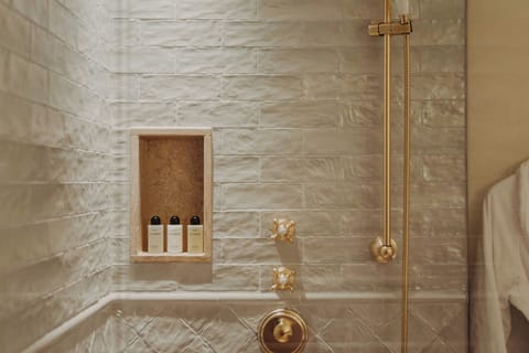 Combined shower/tub, free toiletries, hair dryer, bathrobes