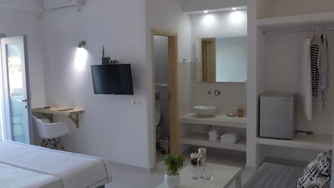 Double or Twin Room, Garden View | Living area | LED TV