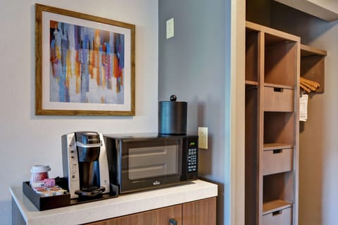 Down comforters, blackout drapes, iron/ironing board, cribs/infant beds