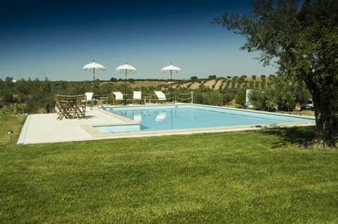 Seasonal outdoor pool, open 9 AM to 8 PM, pool umbrellas, sun loungers