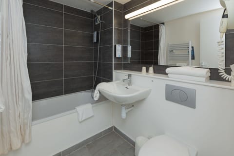 Eco-friendly toiletries, hair dryer, towels, soap