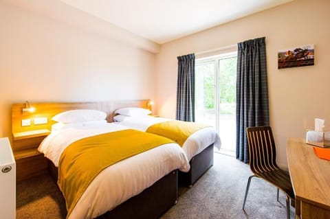 Premium bedding, individually decorated, desk, blackout drapes