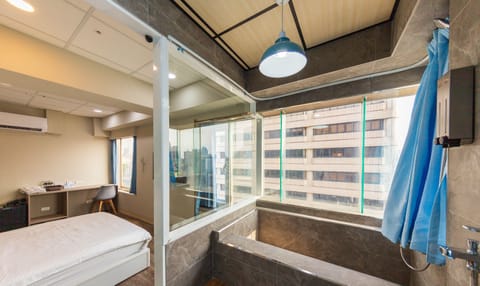 Deluxe Double Room, Bathtub, City View | Bathroom | Combined shower/tub, rainfall showerhead, free toiletries, hair dryer