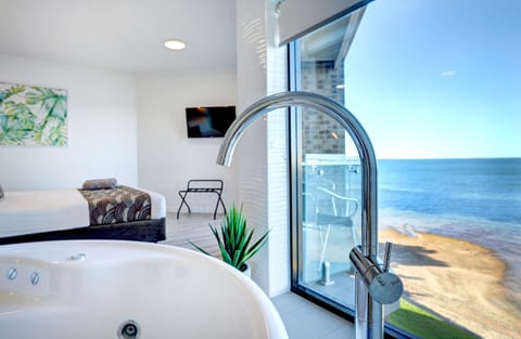 Luxury Studio, 1 King Bed, Jetted Tub, Sea View | Beach/ocean view