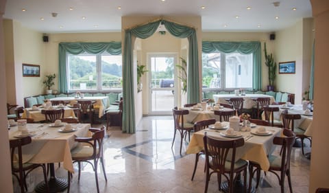 Daily buffet breakfast (EUR 14 per person)