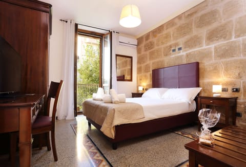 Family Suite, 2 Bedrooms, Balcony | Minibar, in-room safe, individually decorated, individually furnished