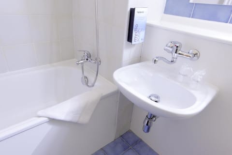 Desk, blackout drapes, free WiFi, bed sheets