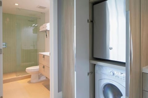 Shower, rainfall showerhead, designer toiletries, hair dryer