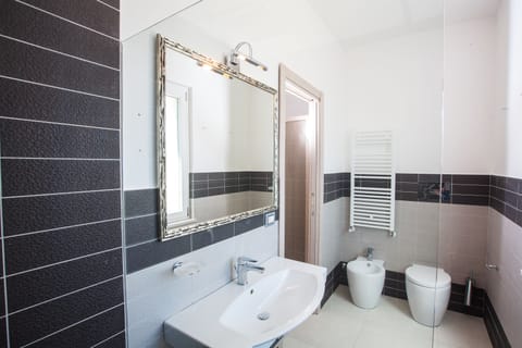 Junior Suite, 1 Bedroom, Balcony | Bathroom | Shower, rainfall showerhead, hair dryer, slippers