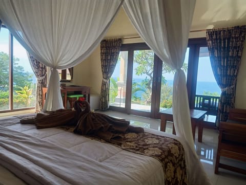 Villa, 1 Bedroom, Sea View | Minibar, in-room safe, desk, blackout drapes