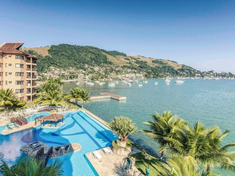 Indoor pool, outdoor pool, pool umbrellas, sun loungers