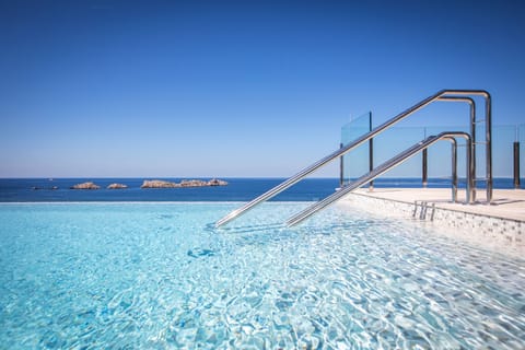 Indoor pool, 2 outdoor pools, pool umbrellas, sun loungers