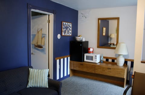 Family Studio Suite, 1 Bedroom, Refrigerator & Microwave, Ground Floor | Premium bedding, blackout drapes, iron/ironing board