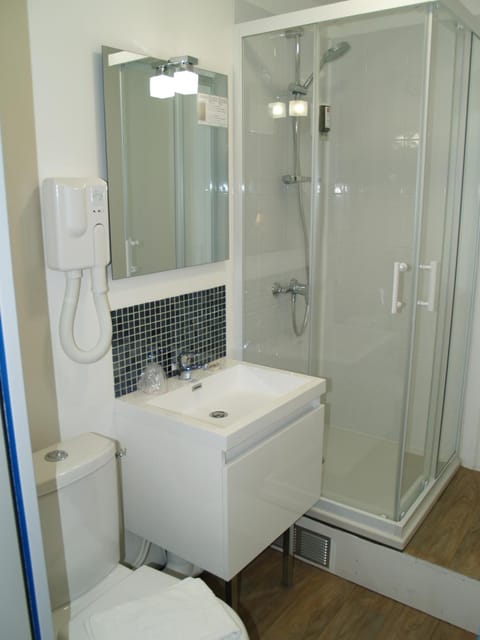 Shower, free toiletries, hair dryer, towels