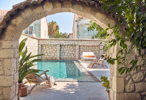 Outdoor pool, open 9:00 AM to 9:00 PM, pool umbrellas, sun loungers