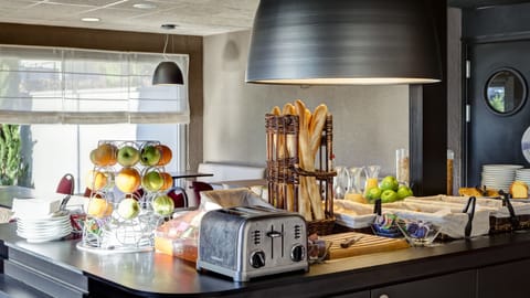 Daily buffet breakfast (EUR 14 per person)