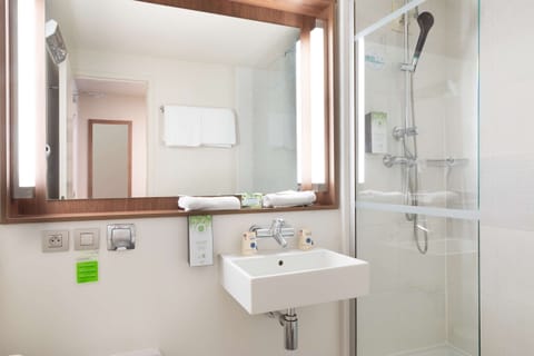 Eco-friendly toiletries, hair dryer, towels