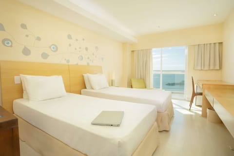 Standard Room, 2 Twin Beds, Balcony, Ocean View | Minibar, desk, blackout drapes, soundproofing