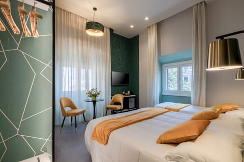 Classic Triple Room | Down comforters, minibar, in-room safe, desk