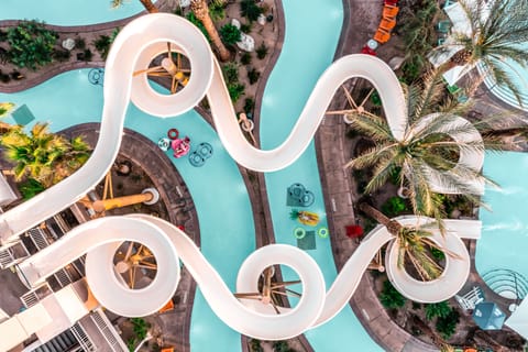 9 outdoor pools, open 7:00 AM to 10:00 PM, cabanas (surcharge)
