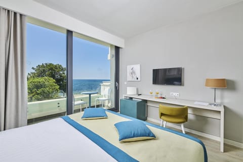 Classic room with balcony, Sea side | In-room safe, desk, blackout drapes, free WiFi