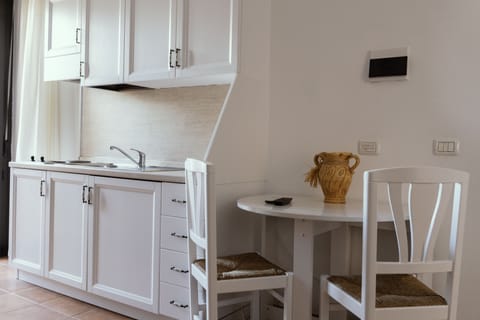 Family Quadruple Room, 1 Queen Bed with Sofa bed, Garden View | Private kitchenette | Fridge