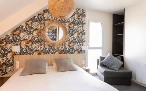 Suite | In-room safe, individually decorated, desk, blackout drapes