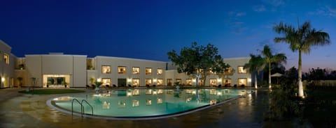 Outdoor pool, open 6:00 AM to 7:00 PM, sun loungers