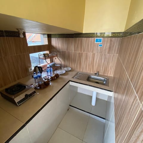 Family Room, 2 Bedrooms | Private kitchen