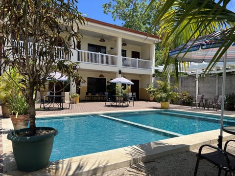 Family Studio Suite, 1 Bedroom | Living area | 32-inch TV with cable channels