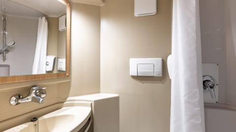 Shower, eco-friendly toiletries, towels, soap