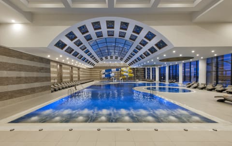 9 indoor pools, 3 outdoor pools, pool umbrellas, sun loungers
