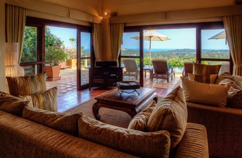 Family Villa, 5 Bedrooms | Living room | 50-inch flat-screen TV with cable channels, TV