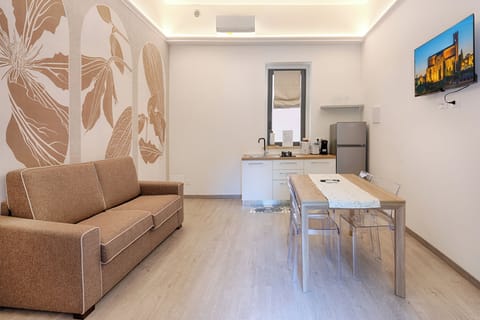 Luxury Apartment | Living area | Flat-screen TV