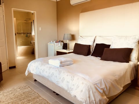Deluxe Triple Room | Premium bedding, blackout drapes, iron/ironing board (on request), WiFi