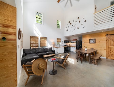 #18 Pioneer Town Inn | Living area | 50-inch TV with cable channels