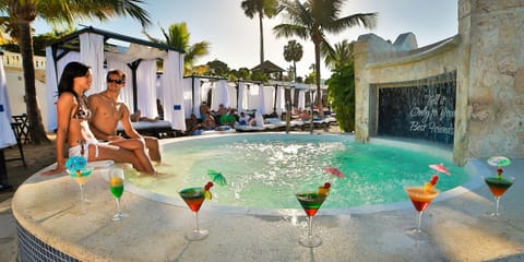 12 outdoor pools, pool umbrellas, sun loungers