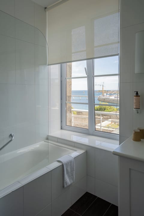 Family Room | Bathroom | Eco-friendly toiletries, hair dryer, towels, shampoo