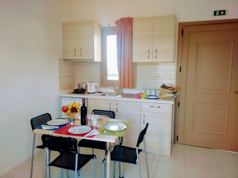 Apartment, 1 Bedroom | Private kitchenette | Fridge, stovetop, coffee/tea maker, electric kettle