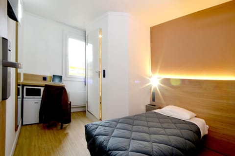 Desk, laptop workspace, blackout drapes, iron/ironing board