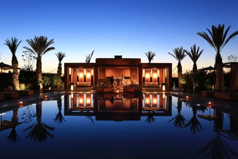 Outdoor pool, open 8:30 AM to 8:00 PM, free cabanas, pool umbrellas