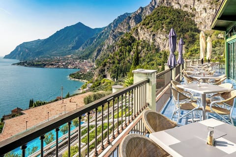 Breakfast, dinner served; local cuisine, alfresco dining 