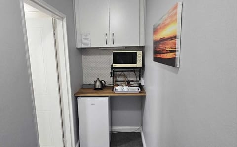Economy Room, 1 Bedroom, Sea View | Private kitchen | Fridge, microwave, cookware/dishes/utensils