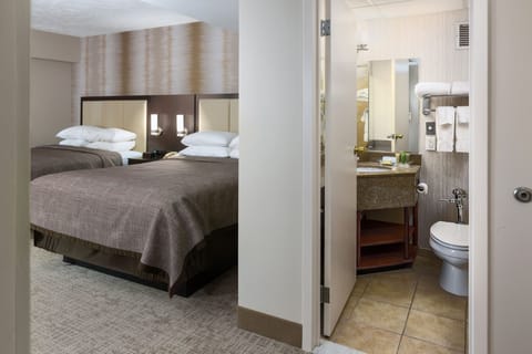 Individually decorated, desk, blackout drapes, iron/ironing board