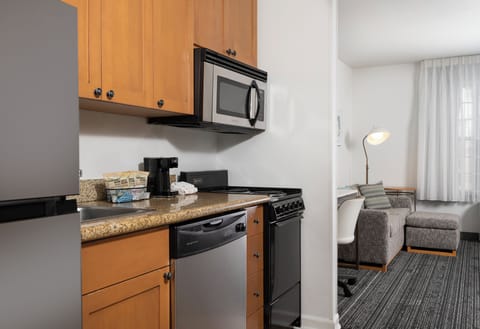 Suite, 1 Bedroom | Private kitchen | Full-size fridge, microwave, stovetop, dishwasher