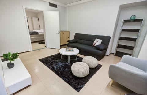One-Bedroom Apartment - 4 - | Living room | Flat-screen TV