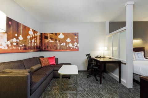 Suite, Multiple Beds | Living area | 32-inch flat-screen TV with satellite channels, TV