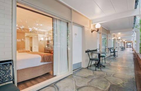 Standard Room, 2 Queen Beds, Refrigerator, Courtyard Area | Blackout drapes, iron/ironing board, rollaway beds, free WiFi