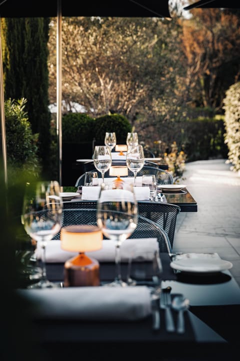 Lunch, dinner served; French cuisine, garden views 