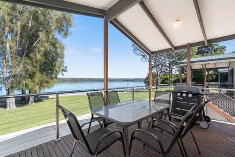 Deluxe Waterfront Cabin | Terrace/patio